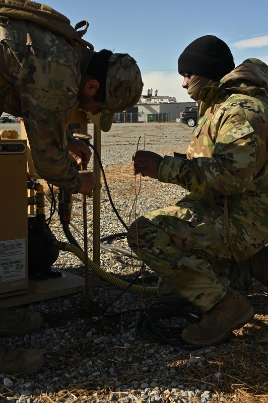 Mission Sustainment Team Members Set Up Emerald Warrior 25.1