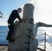 Nimitz Sailor Secures Equipment