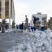 Breaking the Ice: Airmen remove snow, resume flying ops