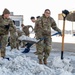 Breaking the Ice: Airmen remove snow, resume flying ops