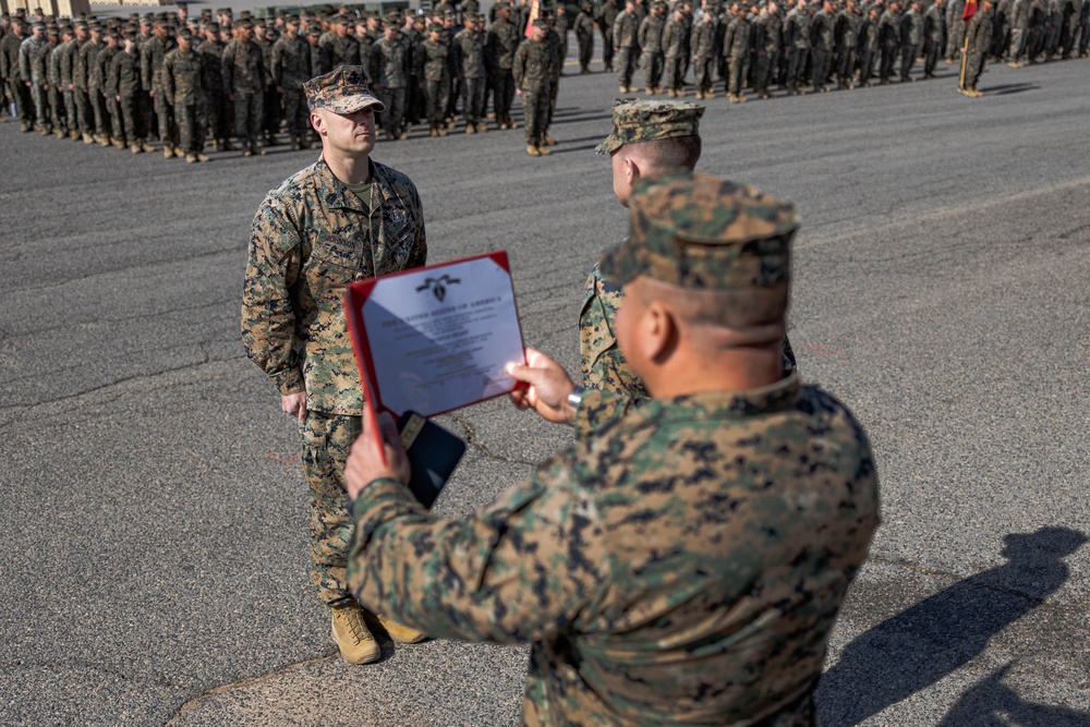 Master Gunnery Sergeant Johnson is presented the Purple Heart