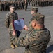 Master Gunnery Sergeant Johnson is presented the Purple Heart