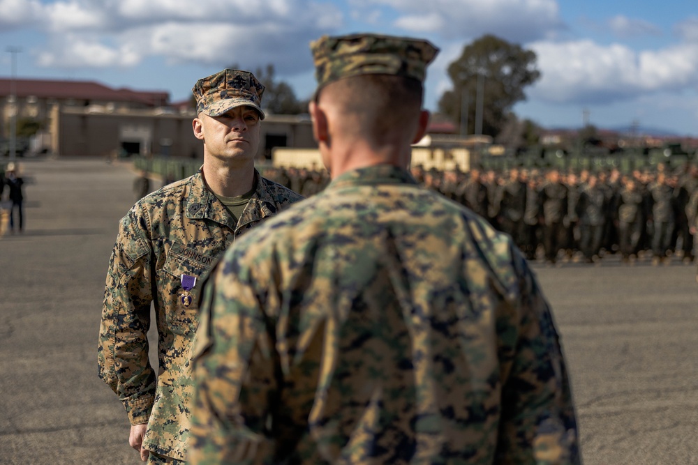 Master Gunnery Sergeant Johnson is presented the Purple Heart