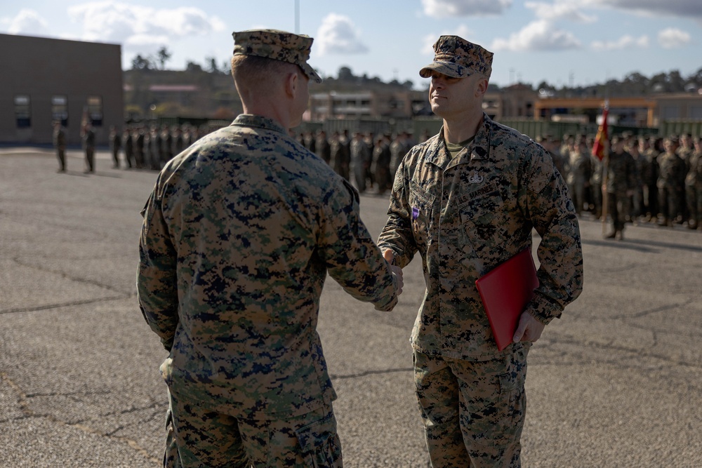 Master Gunnery Sergeant Johnson is presented the Purple Heart