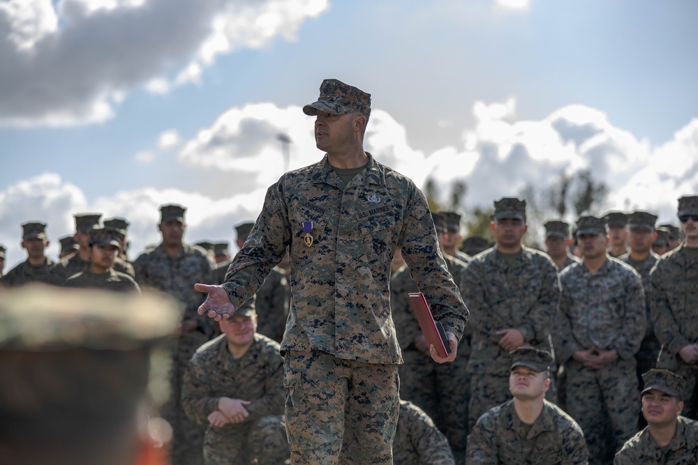 Master Gunnery Sergeant Johnson is presented the Purple Heart