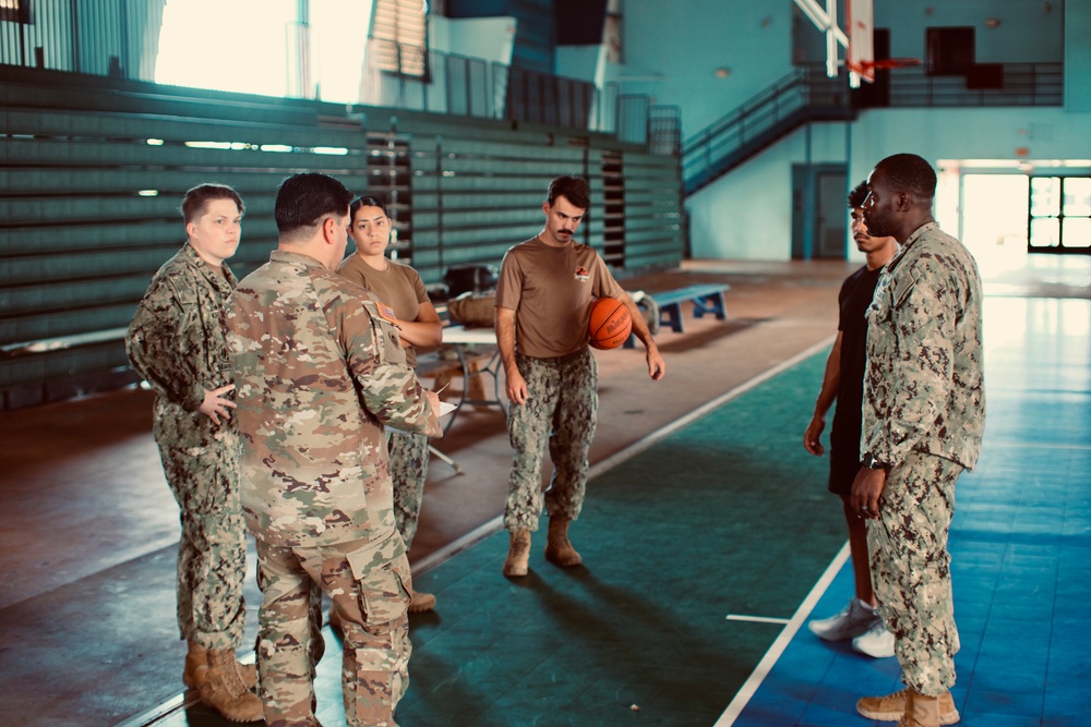 Seabees from Detail Yap joined forces with Oceania engagement team lead Major Orasio Leyva in conducting The Candidate Fitness Assessment (CFA) for local Yapese high school students.