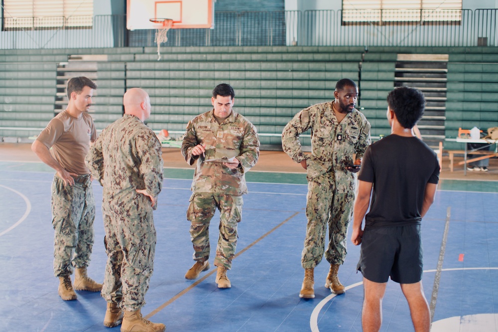 Seabees from Detail Yap joined forces with Oceania engagement team lead Major Orasio Leyva in conducting The Candidate Fitness Assessment (CFA) for local Yapese high school students.
