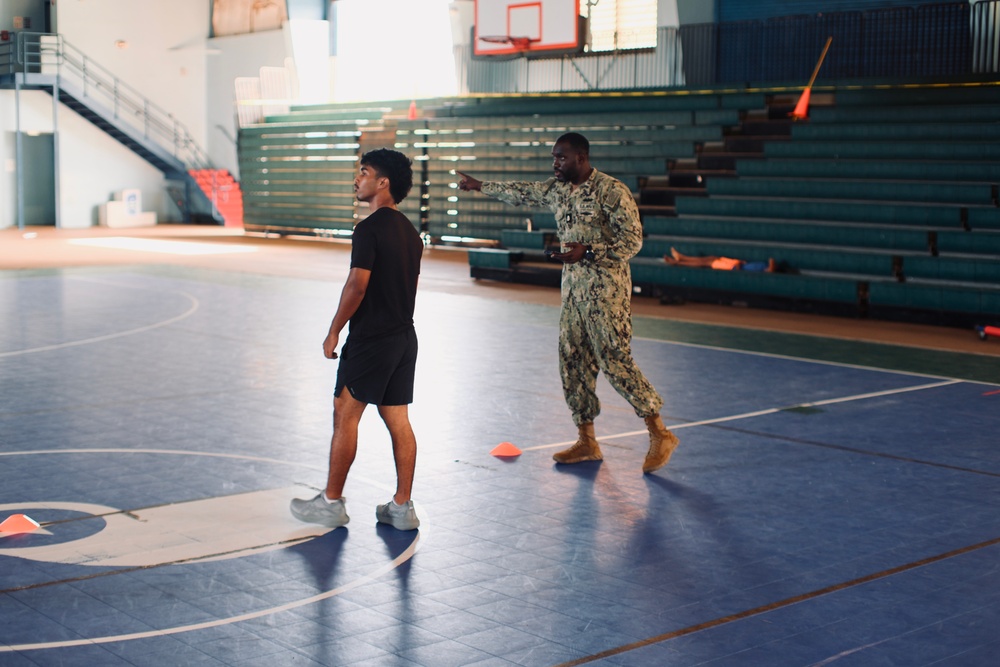 Seabees from Detail Yap joined forces with Oceania engagement team lead Major Orasio Leyva in conducting The Candidate Fitness Assessment (CFA) for local Yapese high school students.
