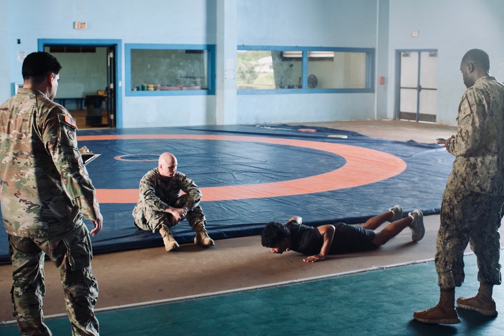 Seabees from Detail Yap joined forces with Oceania engagement team lead Major Orasio Leyva in conducting The Candidate Fitness Assessment (CFA) for local Yapese high school students.