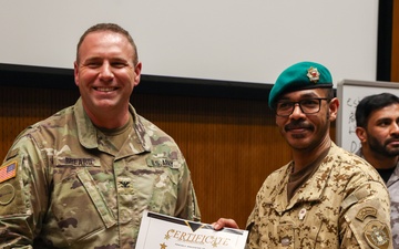 U.S. and GCC Eagle Resolve 2025 participants receive Information Operations Certificates of Appreciation from U.S. ER25 Exercise Director