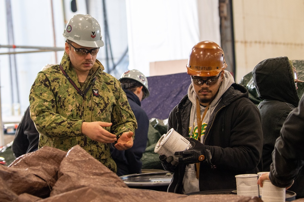 USS Ronald Reagan (CVN 76) Sailors perform supply offload