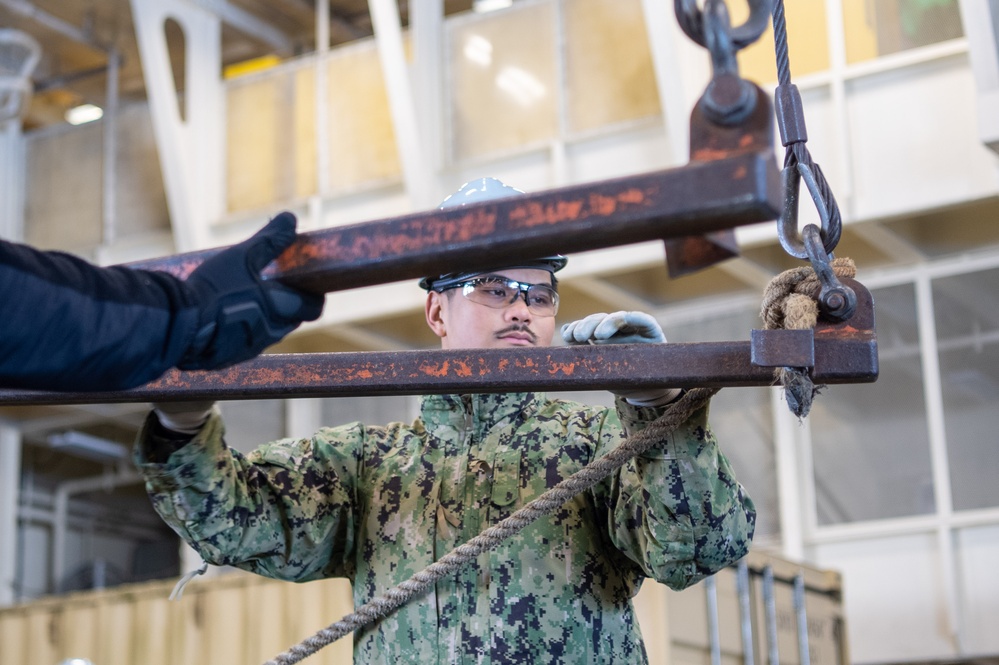 USS Ronald Reagan (CVN 76) Sailors perform supply offload