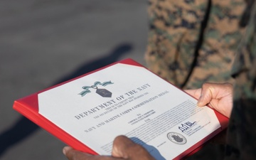 1st MLG Marine receives award for improving testing of communications gear