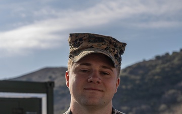 1st MLG Marine receives award for improving testing of communications gear