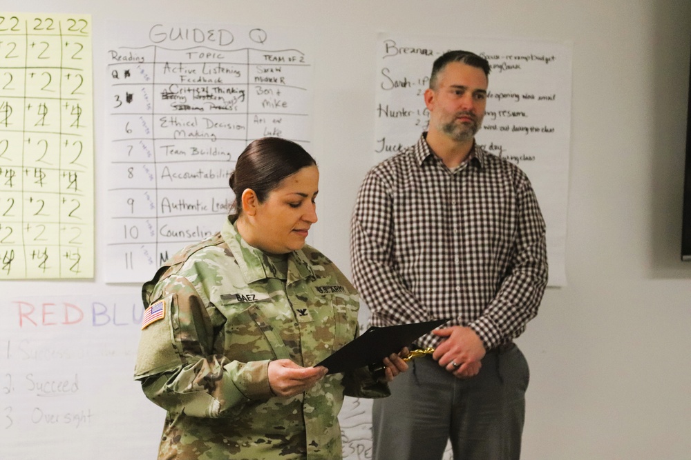 Fort McCoy employee officially presented with AMC quarterly award