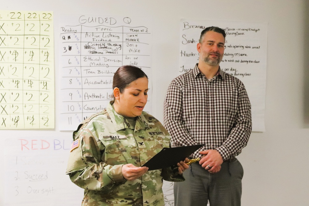 Fort McCoy employee officially presented with AMC quarterly award