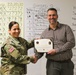 Fort McCoy employee officially presented with AMC quarterly award