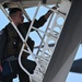 A 34th Expeditionary Bomb Squadron pilot steps in to a B-1B Lancer from Andersen Air Force Base for a Bomber Task Force 25-1 mission