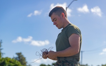 U.S. Marines establish radio communications from Tinian