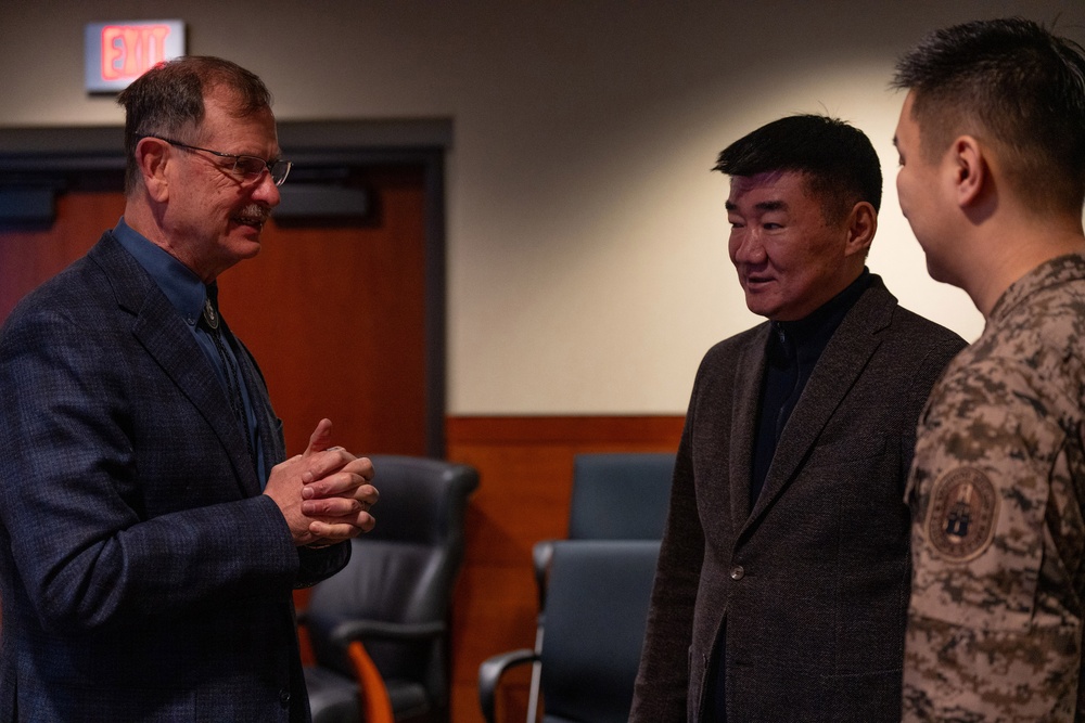 Mongolian Defense Minister meets Ted Stevens Center Director during visit to JBER to strengthen security cooperation