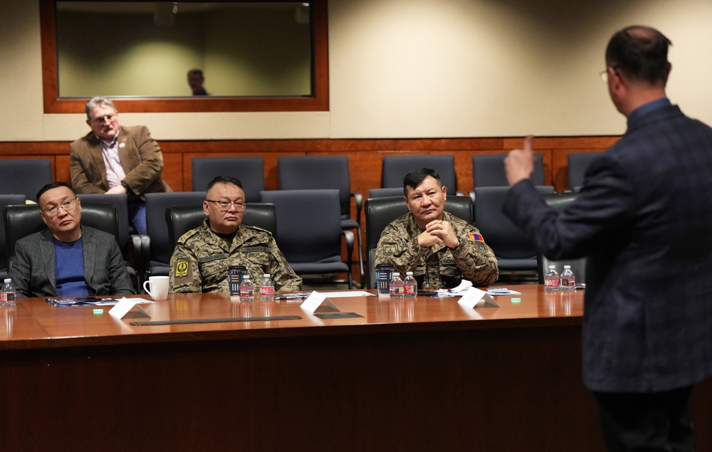 Mongolian Defense Minister meets Ted Stevens Center Director during visit to JBER to strengthen security cooperation