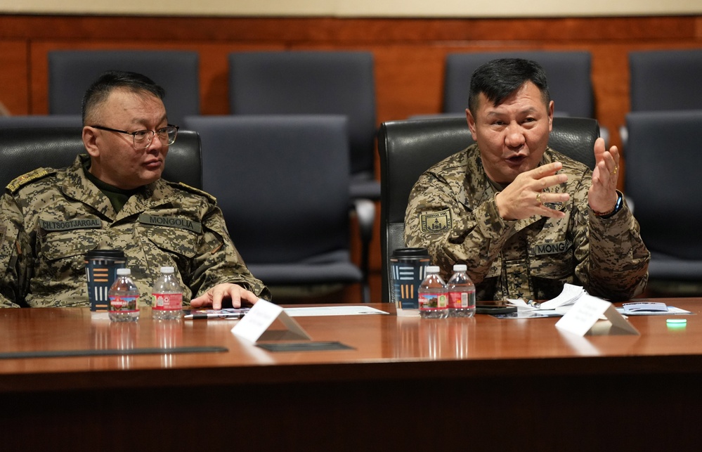 Mongolian Defense Minister meets Ted Stevens Center Director during visit to JBER to strengthen security cooperation