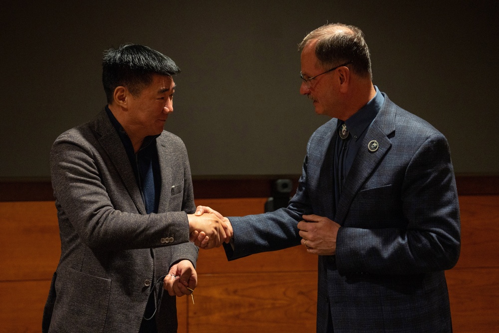 Mongolian Defense Minister meets Ted Stevens Center Director during visit to JBER to strengthen security cooperation