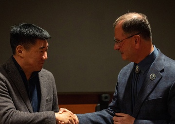 Mongolian Defense Minister meets Ted Stevens Center Director during visit to JBER to strengthen security cooperation