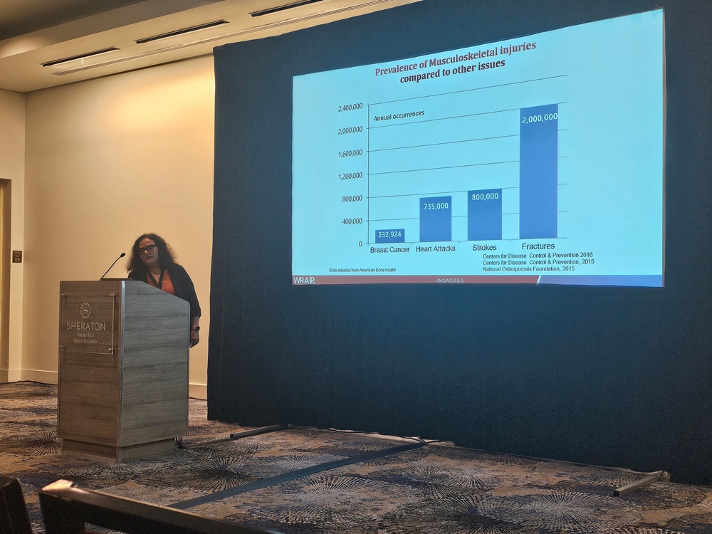 Dr. Aarti Gautam, research biologist at the Walter Reed Army Institute of Research, presents at the 40th annual American Society for Gravitational and Space Research.