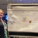 Ms. Allison Hoke, Lead Lab Science Tech at the Walter Reed Army Institute of Research, presents a poster at the 40th annual American Society for Gravitational and Space Research.