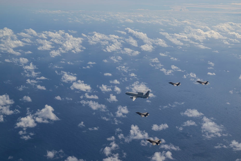 U.S., JASDF and RAAF aircraft fly in formation during CN25