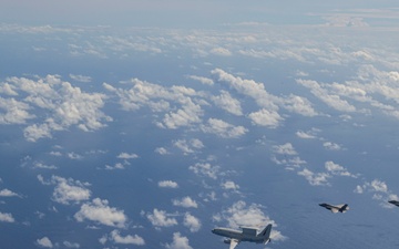 U.S., JASDF and RAAF aircraft fly in formation during CN25