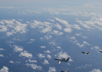 U.S., JASDF and RAAF aircraft fly in formation during CN25