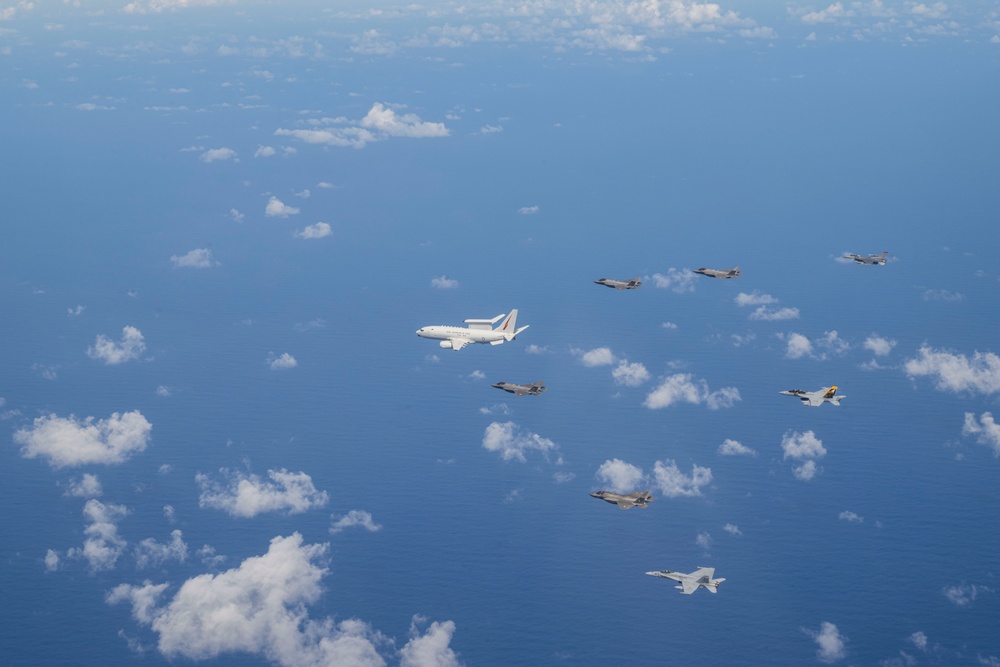 U.S., JASDF and RAAF aircraft fly in formation during CN25