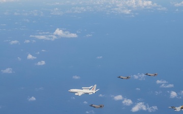 U.S., JASDF and RAAF aircraft fly in formation during CN25