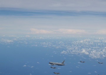 U.S., JASDF and RAAF aircraft fly in formation during CN25