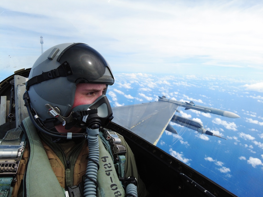 U.S., JASDF and RAAF aircraft fly in formation during CN25