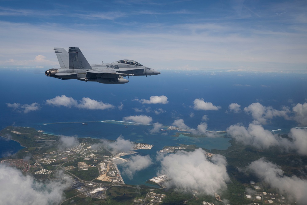 U.S., JASDF and RAAF aircraft fly in formation during CN25