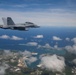 U.S., JASDF and RAAF aircraft fly in formation during CN25