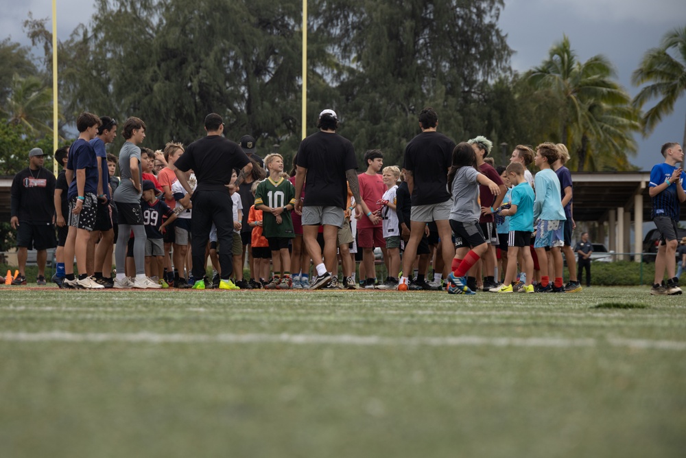 Legends and Heroes Unite: National Football League Hall of Famers and Cheerleaders join forces with Marines at MCBH