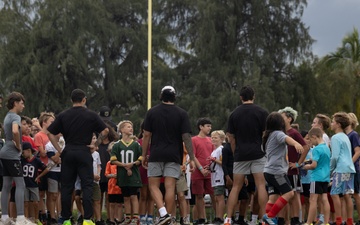 Legends and Heroes Unite: National Football League Hall of Famers and Cheerleaders join forces with Marines at MCBH