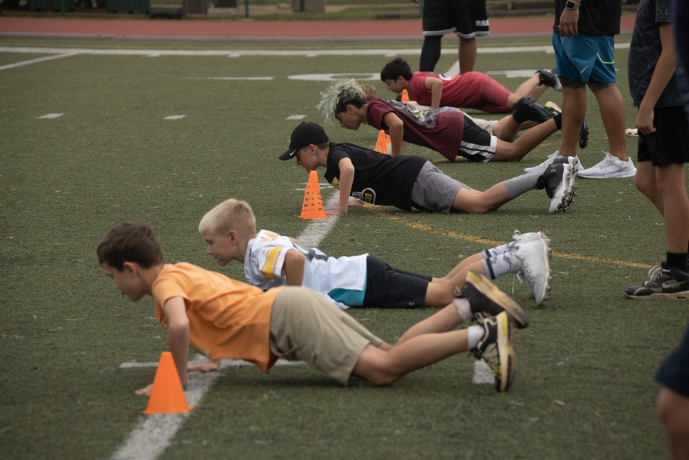 Legends and Heroes Unite: National Football League Hall of Famers and Cheerleaders join forces with Marines at MCBH