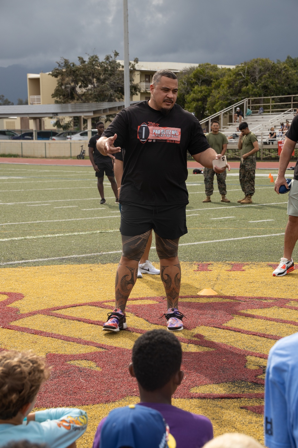 Legends and Heroes Unite: National Football League Hall of Famers and Cheerleaders join forces with Marines at MCBH