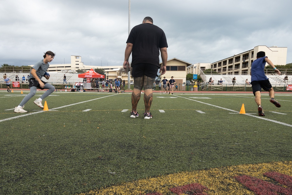 Legends and Heroes Unite: National Football League Hall of Famers and Cheerleaders join forces with Marines at MCBH