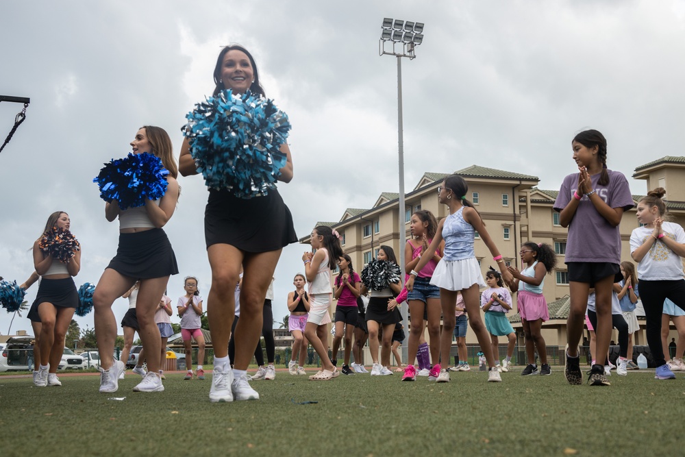 Legends and Heroes Unite: National Football League Hall of Famers and Cheerleaders join forces with Marines at MCBH