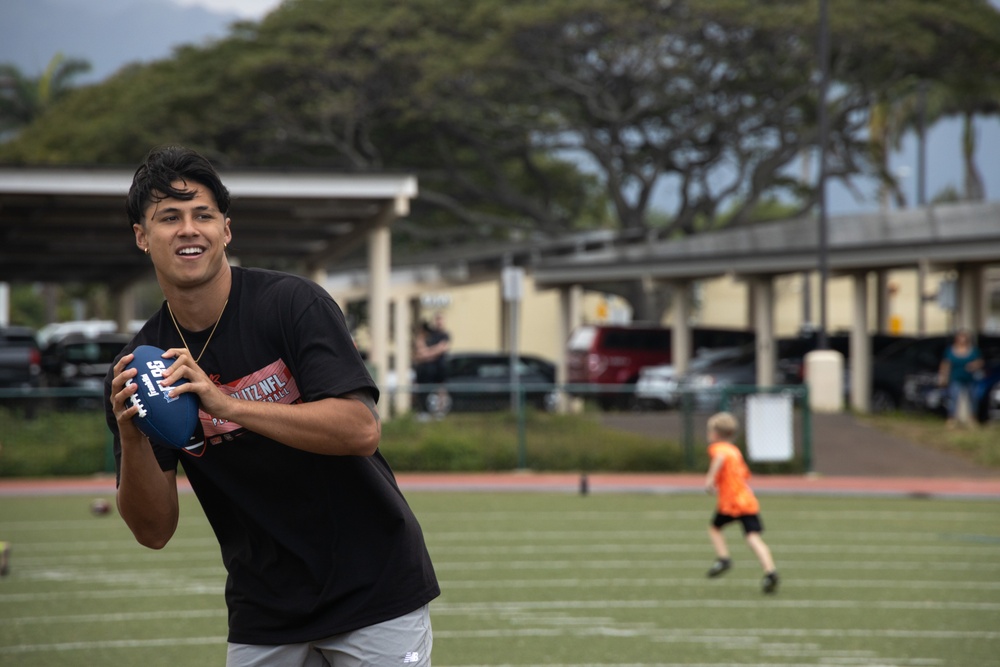 Legends and Heroes Unite: National Football League Hall of Famers and Cheerleaders join forces with Marines at MCBH