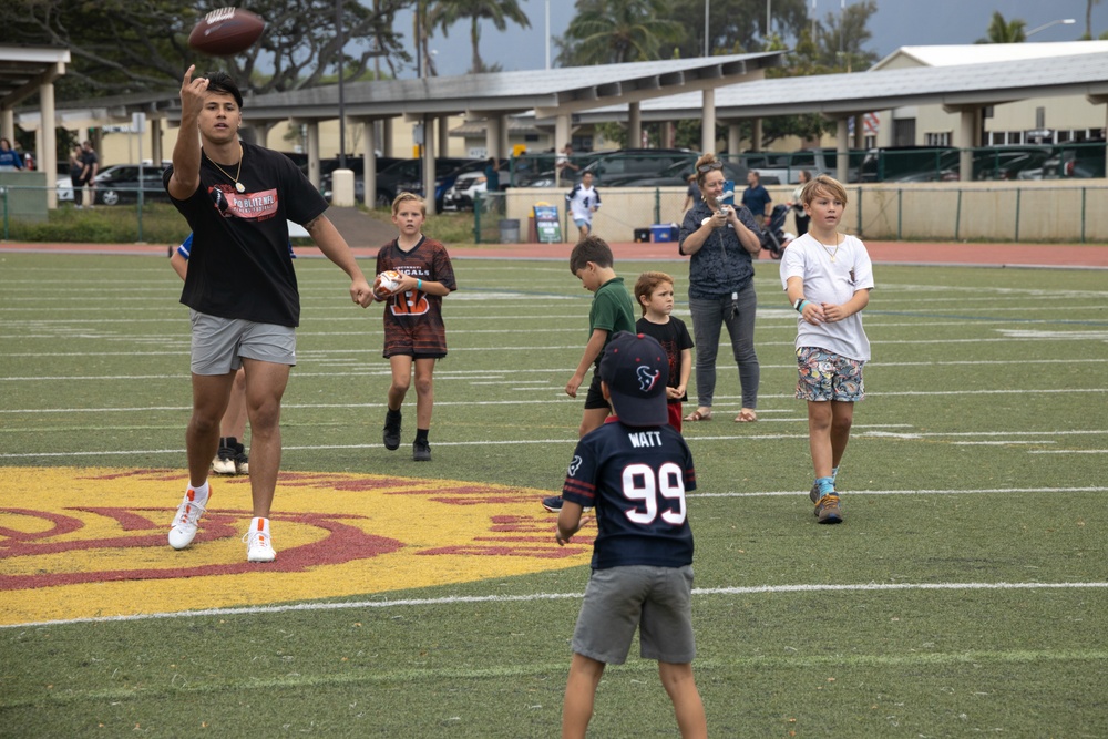 Legends and Heroes Unite: National Football League Hall of Famers and Cheerleaders join forces with Marines at MCBH