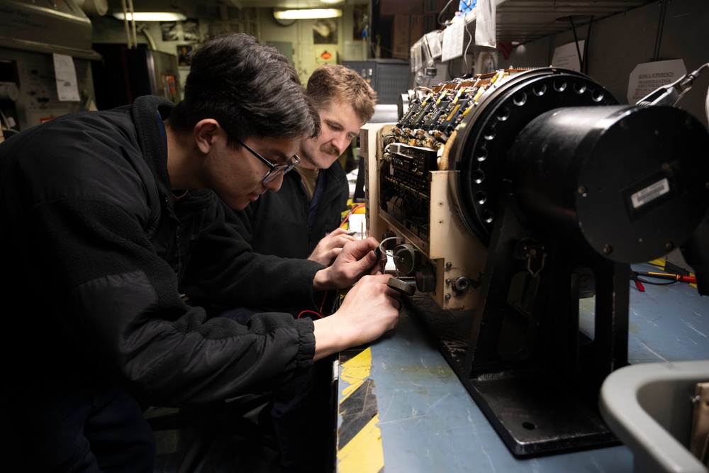 Nimitz Sailor Conducts an Electrical Check