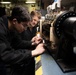 Nimitz Sailor Conducts an Electrical Check