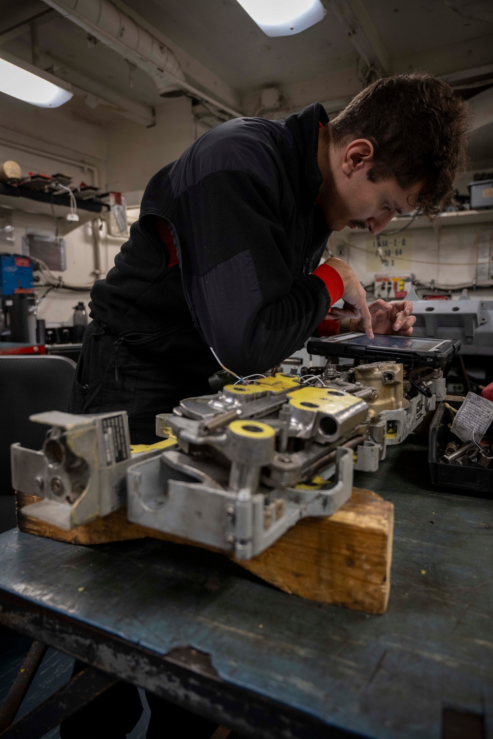 Nimitz Sailor Reassembles Bomb Rack